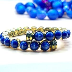 Plunder Blue Goldtone Glass Bezeled Bracelet Magnetic Closure